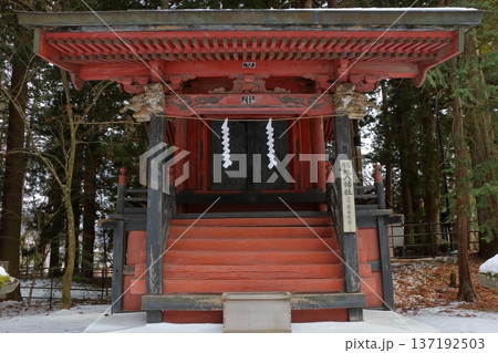 Kitaguchi Hongu Sengen Jinja Shrine in Fujiyoshida of Yamanashi Japan during the winter. This is the traditional Shinto entrance to the path to the summit of Mt. Fuji, and dates from the year 100AD 137192503