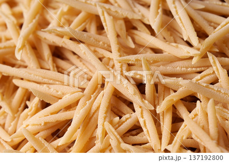 Dry Italian Pasta trofie Texture and Background for Culinary Design. 137192800