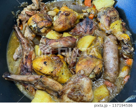 Rustic Roasted Meat with Chicken Rabbit and Butifarra 137194586