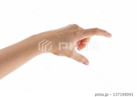 Young woman hand holding something with fingers isolated on white background 137198091