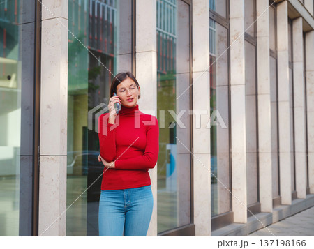 Woman in glasses stands in center of Frankfurt, Woman in glasses stands in center of Frankfurt, 137198166