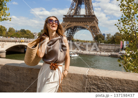 Fashionable Woman Enjoying Sunny Paris Landmark View 137198437