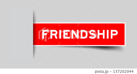 Red color square shape sticker label with word friendship inserted in gray background 137202044