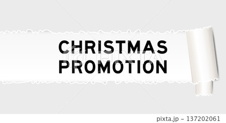 Ripped gray paper background that have word christmas promotion under torn part Ripped gray paper background that have word christmas promotion under torn part 137202061