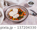 Chicken fillet and mexican mixed vegetables steamed on a plate on the table 137204330