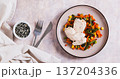 Chicken fillet and mexican mixed vegetables steamed on a plate on the table top view web banner 137204336