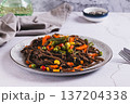 Vegetarian soba with mexican mixed vegetables on a plate on the table 137204338