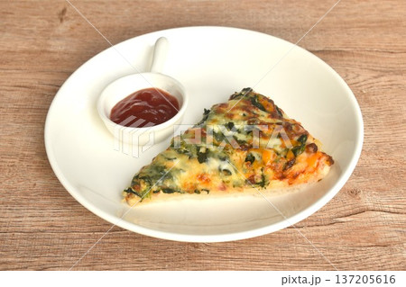 baking pizza topping spinach and on plate dipping ketchup in cup baking pizza topping spinach and on plate dipping ketchup in cup 137205616