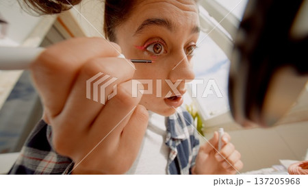 Actor meticulously creating theatrical look before show begins Actor meticulously creating theatrical look before show begins 137205968