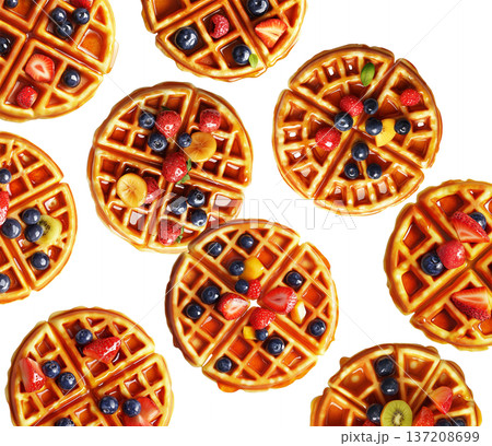 Top view of waffles with mixed fruits isolated on white background, conveying a bright breakfast concept 137208699
