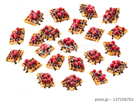 Belgian waffles with raspberries and chocolate isolated on white background as concept of tasty dessert 137208702