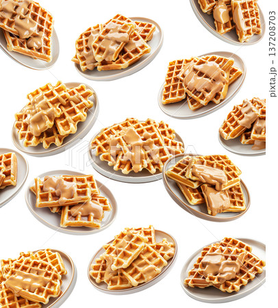 Multiple plates of golden waffles with creamy topping isolated on white background, concept of delicious breakfast food 137208703