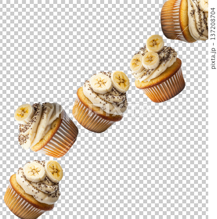 Banana cupcakes topped with cream frosting, banana slices, and chia seeds, isolated on a white background 137208704