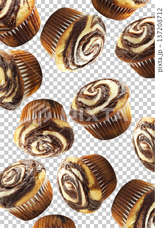 Delicious chocolate marble muffins in scattered layout, isolated on white background. Concept of sweet bakery treats 137208712