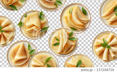 Multiple plates of folded golden crepes decorated with green leaves, top view isolated on white background, concept of food presentation 137208728