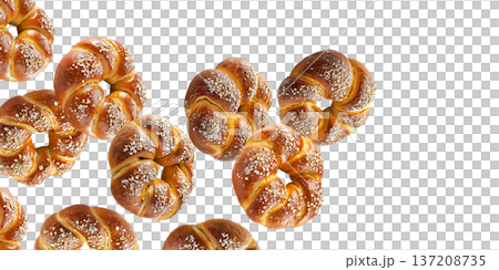 Multiple twisted pretzel buns or bagel with coarse salt topping arranged in seamless pattern isolated on white background 137208735