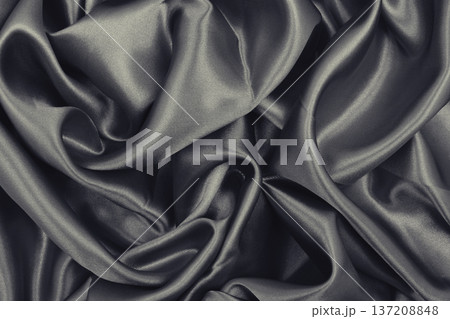 Smooth elegant brown silk or satin texture as abstract background. Luxurious background design. Sepia toned. Retro style 137208848