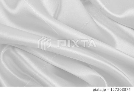 Smooth elegant white silk or satin luxury cloth texture as wedding background. Luxurious background design 137208874