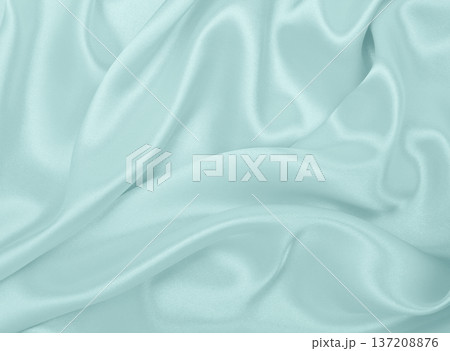 Smooth elegant blue silk or satin luxury cloth texture as abstract background. Luxurious background design Smooth elegant blue silk or satin luxury cloth texture as abstract background. Luxurious background design 137208876