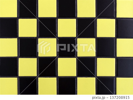 Yellow ceramic tile background. Old vintage ceramic tiles in yellow to decorate the kitchen or bathroom Yellow ceramic tile background. Old vintage ceramic tiles in yellow to decorate the kitchen or bathroom 137208915