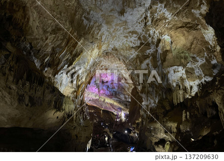 Karst cave with stalactites and stalagmites, fantasy subterranean wonderland background 137209630