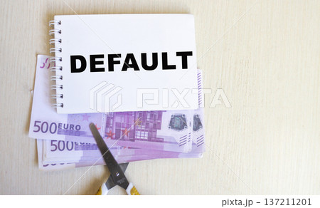 On the background of euro notes with the inscription "default" on a light background On the background of euro notes with the inscription "default" on a light background 137211201