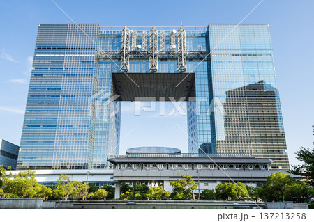 View of the Telecom Center Building and Telecom Center Station on the Yurikamome Line in Koto, Tokyo, Japan. 137213258