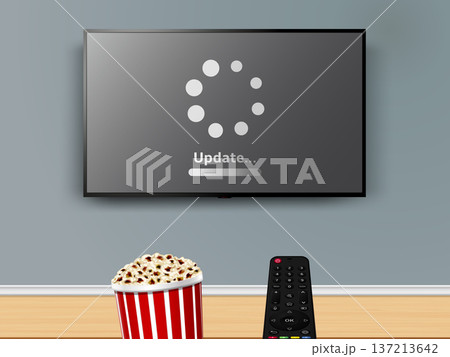 Update progress on tv screen. Popcorn and remote control in front of tv screen. Watching online tv with remote control and popcorn striped box. Update progress on tv screen. Popcorn and remote control in front of tv screen. Watching online tv with remote control and popcorn striped box. 137213642