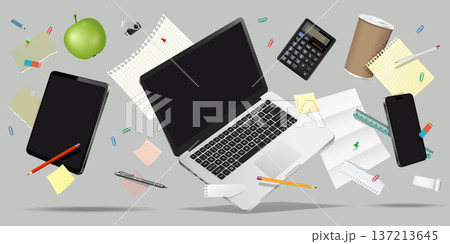 Laptop computer, smartphone, tablet and office supplies while levitating in the air on grey background. 137213645