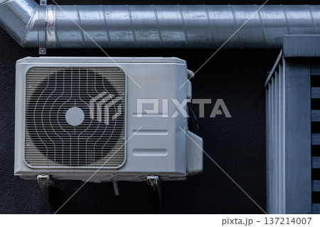 air conditioning on facade of building, air cooling in hot weather.  137214007