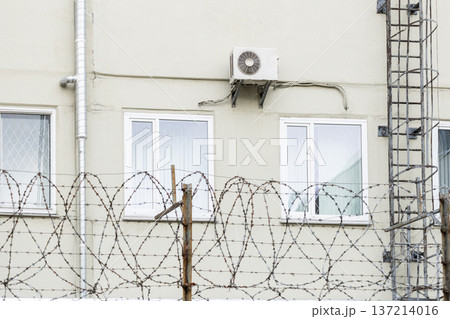 air conditioning on facade of building, air cooling in hot weather. air conditioning on facade of building, air cooling in hot weather. 137214016