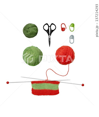 Tools for knitting warm clothes: scissors, green and red balls of thread, stoppers, and knitting needles with knitted green red piece of fabric isolated on transparent background. Hobby home crafts. Tools for knitting warm clothes: scissors, green and red balls of thread, stoppers, and knitting needles with knitted green red piece of fabric isolated on transparent background. Hobby home crafts. 137214293