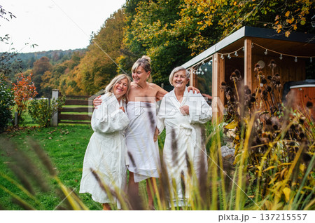 Happy senior friends during wellness retreat. Happy senior friends during wellness retreat. 137215557