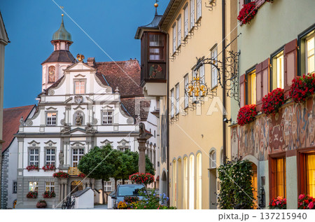 Wangen, germany, august 17, 2023. Wangen im allgau old town at twilight, historic bavarian facades and flowered windows lining cobblestone streets, illuminated charm 137215940