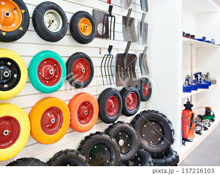 Wheels of wheelbarrow in shop Wheels of wheelbarrow in shop 137216103