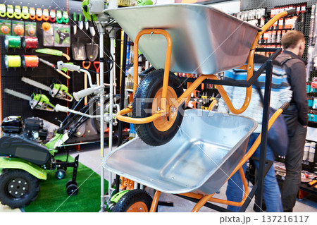 Garden wheelbarrows and tools in store 137216117