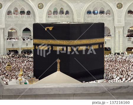Pilgrims performing Tawaf around the Kaaba at Masjid al-Haram in Mecca during pilgrimage Pilgrims performing Tawaf around the Kaaba at Masjid al-Haram in Mecca during pilgrimage 137216160