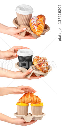 Takeaway Coffee Cups with Croissants in Female Hands 137216203