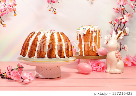 Traditional Easter cake and marbled Easter eggs, decorated with golden turmeric and hibiscus tea, against a backdrop of cherry blossom branches, Easter celebration concept, Traditional Easter cake and marbled Easter eggs, decorated with golden turmeric and hibiscus tea, against a backdrop of cherry blossom branches, Easter celebration concept, 137216422