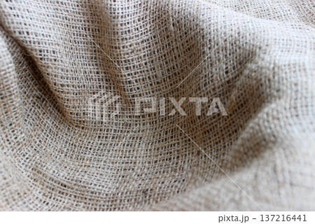 Handicraft Open Weave Burlap Nest Closeup View. Rough Crumpled Burlap Background 137216441
