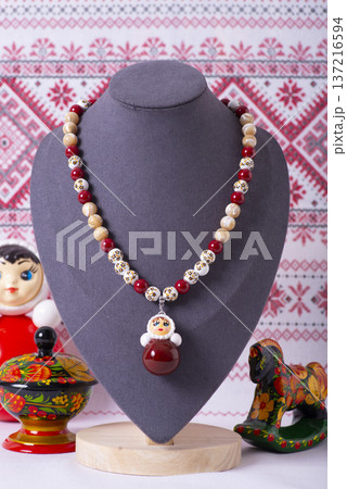 Russian symbols matryoshka, balalaika, rubles cash and flag of russian federation on wooden background. 137216594