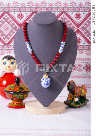 Russian symbols matryoshka, balalaika, rubles cash and flag of russian federation on wooden background. Russian symbols matryoshka, balalaika, rubles cash and flag of russian federation on wooden background. 137216595