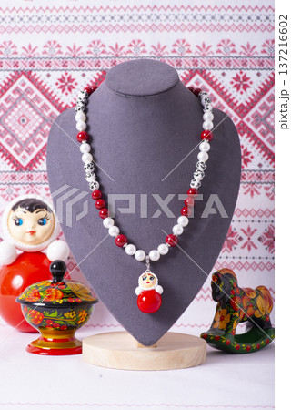 Russian symbols matryoshka, balalaika, rubles cash and flag of russian federation on wooden background. Russian symbols matryoshka, balalaika, rubles cash and flag of russian federation on wooden background. 137216602