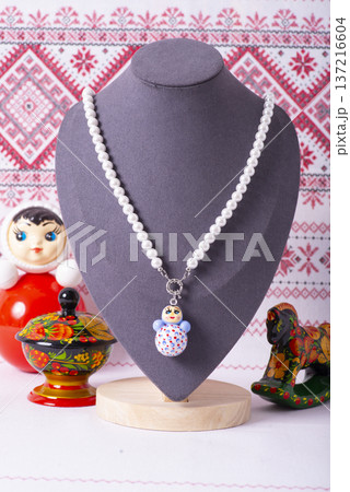 Russian symbols matryoshka, balalaika, rubles cash and flag of russian federation on wooden background. Russian symbols matryoshka, balalaika, rubles cash and flag of russian federation on wooden background. 137216604