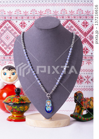 Russian symbols matryoshka, balalaika, rubles cash and flag of russian federation on wooden background. Russian symbols matryoshka, balalaika, rubles cash and flag of russian federation on wooden background. 137216616
