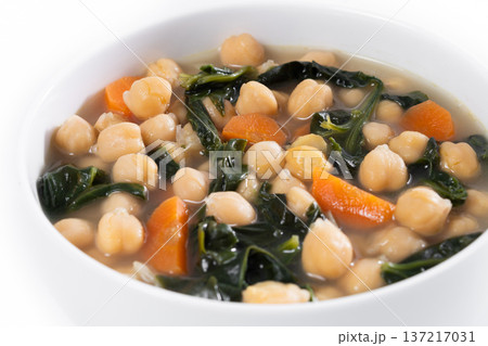 Chickpea and Spinach Soup with Carrots in White Bowl Chickpea and Spinach Soup with Carrots in White Bowl 137217031