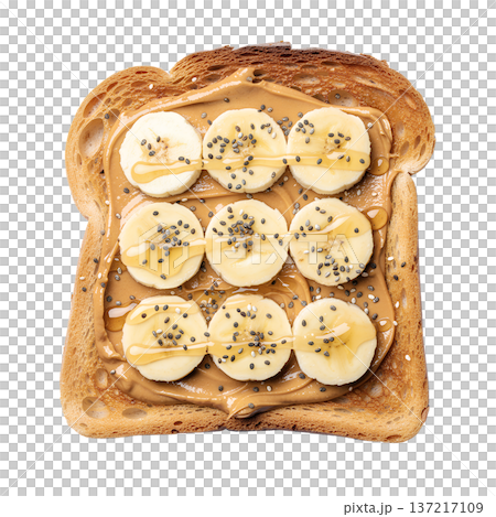 Slice of toast spread with peanut butter, topped with fresh banana slices, chia seeds, and a honey drizzle, isolated Slice of toast spread with peanut butter, topped with fresh banana slices, chia seeds, and a honey drizzle, isolated 137217109