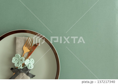 Saint Patrick Day Table Setting with Clover Decor. Festive Green Arrangement Saint Patrick Day Table Setting with Clover Decor. Festive Green Arrangement 137217340