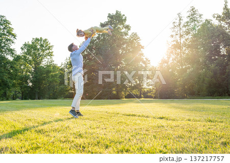 Father child. Parent and child spending quality time outdoors. Father child. Parent and child spending quality time outdoors. 137217757