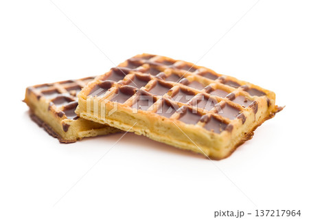 Sweet waffles with chocolate isolated on white background. 137217964